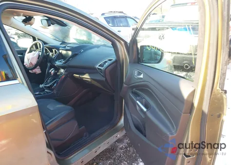 2013 Ford Escape Titanium z USA, uszkodzony, nr VIN 1FMCU0J96DUD41797